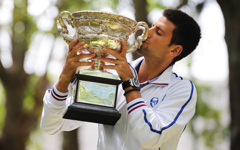 Djokovic claims longest final